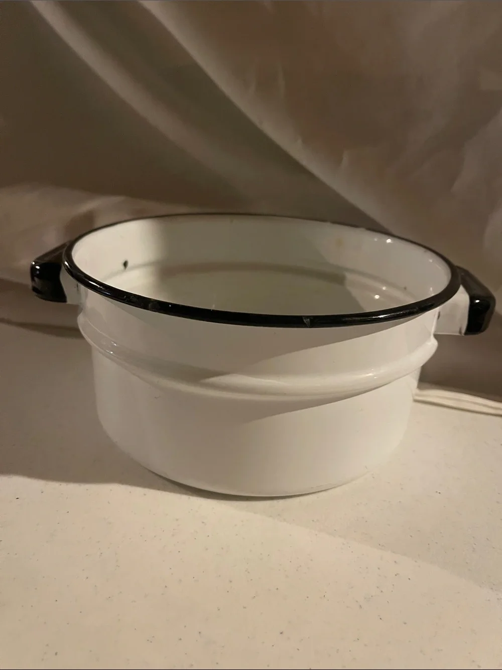 Antique White Enamel Serving Bowl with Black Rim